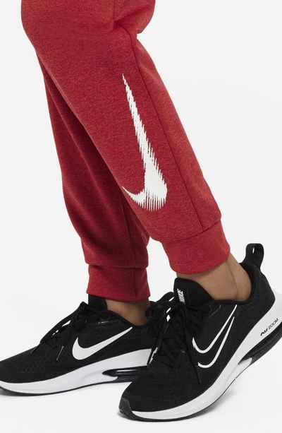 Shop Nike Kids' Therma Multi+ Training Joggers In Gym Red/ University Red/ White