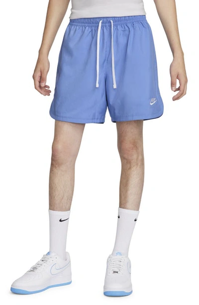 Shop Nike Woven Lined Flow Shorts In Polar/ White