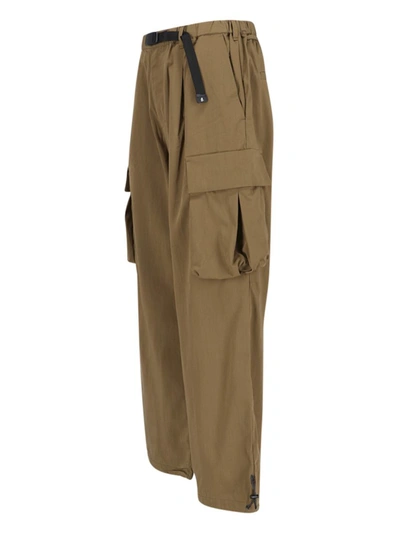 Shop Gramicci Trousers In Brown