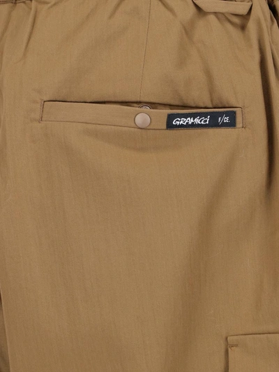 Shop Gramicci Trousers In Brown