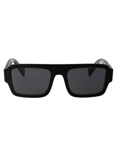 Shop Prada Eyewear Rectangular Frame Sunglasses In Black