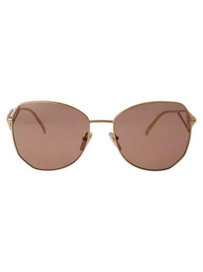 Shop Prada Eyewear Round Frame Sunglasses In Gold
