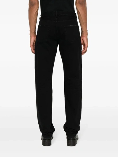 Shop Saint Laurent Straight Cut Jeans In Black
