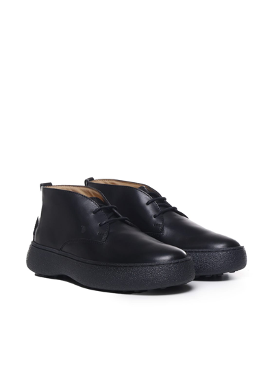 Shop Tod's Desert Ankle Boots In Black