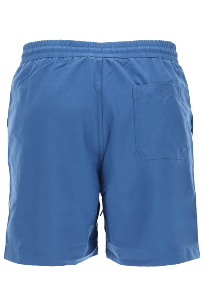 Shop Carhartt Chase Swim Trunks In Liberty Gold (blue)