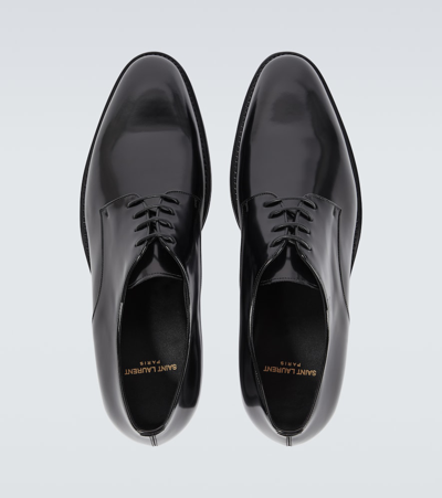 Shop Saint Laurent Adrien Leather Derby Shoes In Black