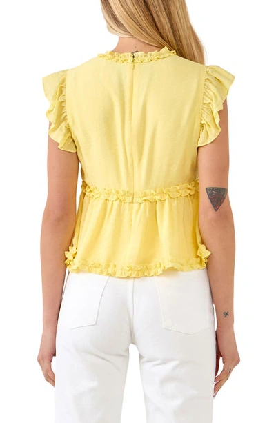 Shop Endless Rose Ruffle Trim Empire Waist Blouse In Yellow