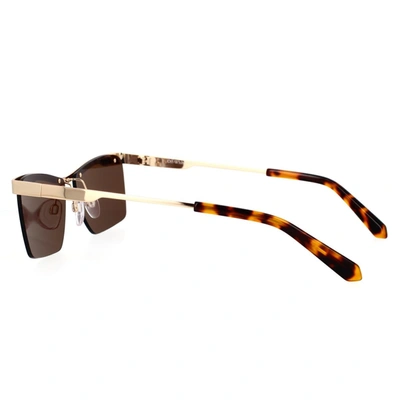 Shop Off-white Sunglasses In Gold