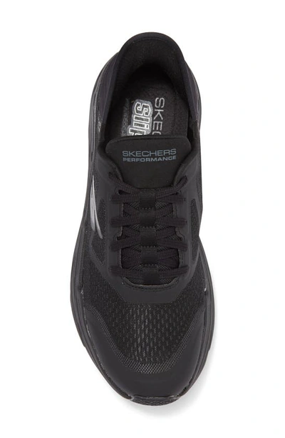 Shop Skechers Max Cushioning Premier Sneaker In Black