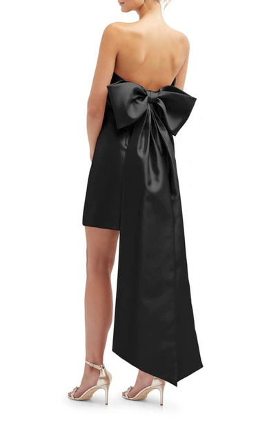 Shop Alfred Sung Oversize Bow Back Strapless Minidress In Black