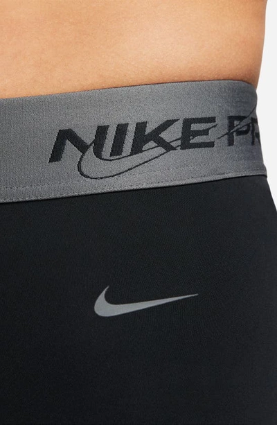 Shop Nike Pro Mid Rise Graphic Training Shorts In Black/ Iron Grey