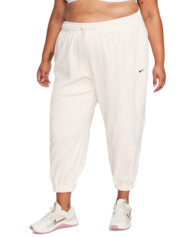 Shop Nike Plus Size Therma-fit Loose Fleece Jogger Pants In Pale Ivory,black