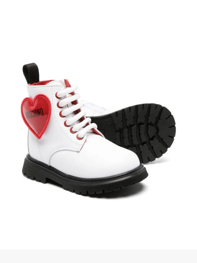 Shop Moschino Ankle Boots With Heart Logo In White