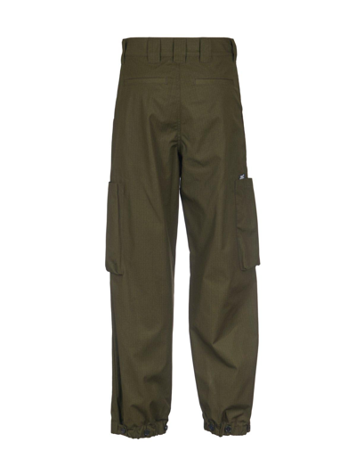 Shop Msgm Cargo Tapered Trousers In Olive
