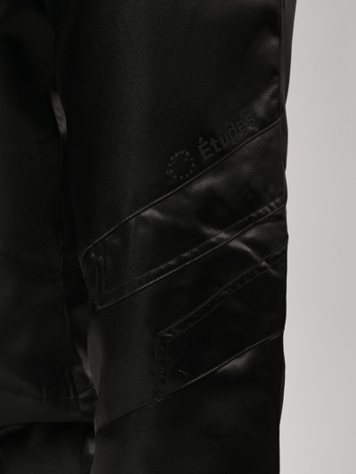 Shop Etudes Studio Black Tour Satin-finish Trousers In Nero