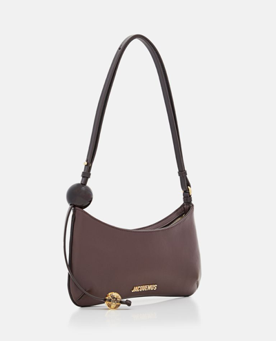 Shop Jacquemus Le Bisou Perle Leather Shoulder Bag In Brown