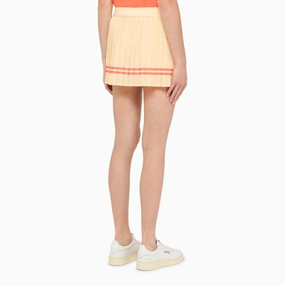 Shop Sporty And Rich Sporty & Rich Almond Pleated Miniskirt In Beige