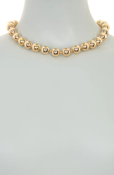 Shop Tasha Ball Chain Toggle Necklace In Gold