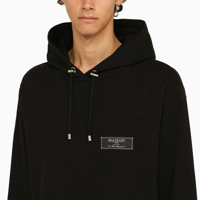 Shop Balmain Wide Black Hoodie With Logo Patch Men