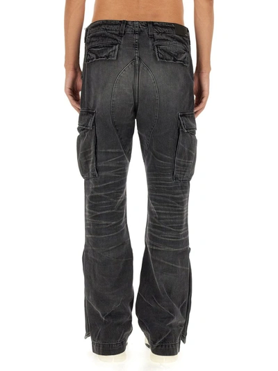 Shop Amiri "m65" Cargo Jeans In Black