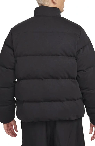 Shop Nike Oversize Therma-fit Down Puffer Jacket In Black/ Black