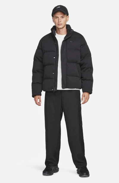 Shop Nike Oversize Therma-fit Down Puffer Jacket In Black/ Black