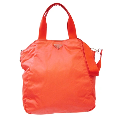 Shop Prada Vela Orange Synthetic Tote Bag ()