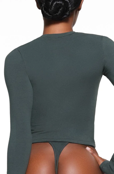 Shop Skims Stretch Jersey Long Sleeve T-shirt In Spruce