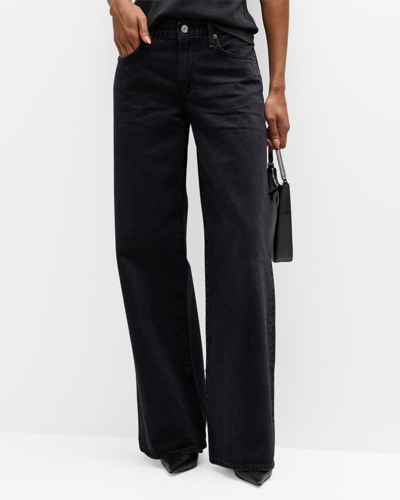 Shop Agolde Clara Low-rise Baggy Flare Jeans In Mascara