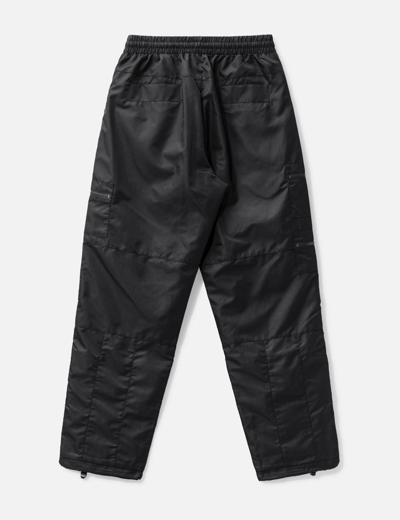 Shop Unknown Nylon Tech Zip Pants In Black