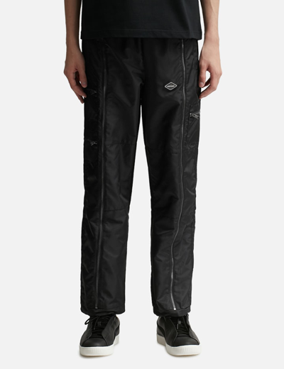 Shop Unknown Nylon Tech Zip Pants In Black