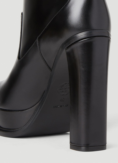 Shop Alexander Mcqueen Women Eyelet Heeled Boots In Black