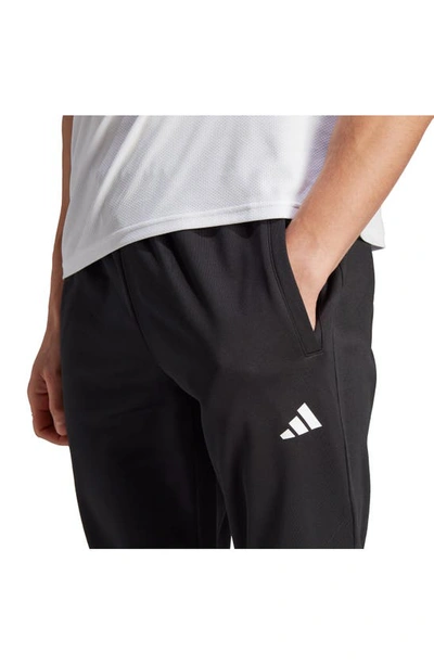 Shop Adidas Originals Game & Go Training Pants In Black/ White