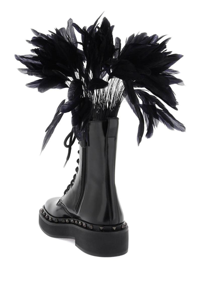Shop Valentino Garavani Leather M-way Rockstud Combat Boots With Feathers In Black