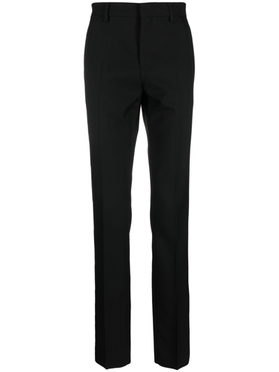 Shop Versace Black Slim-cut Wool Trousers In Nero