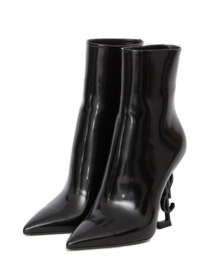 Shop Saint Laurent Opyum Logo Plaque Pointed Toe Boots In Black