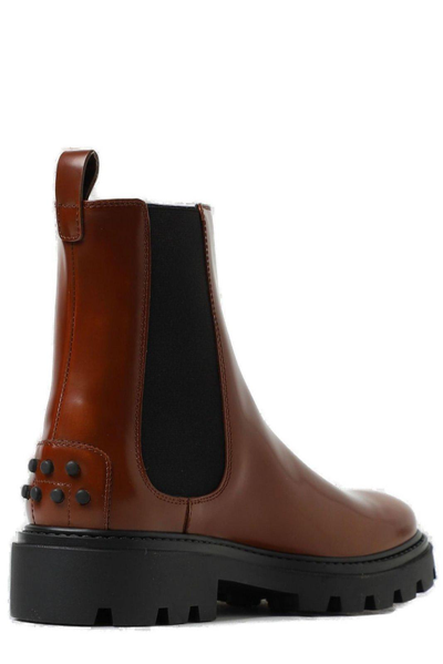Shop Tod's Studded Round Toe Chelsea Boots In Cuoio