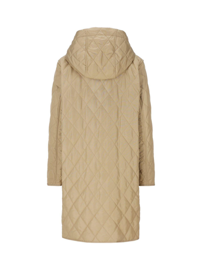 Shop Burberry Quilted Hooded Drawstring Coat In Beige