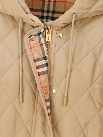 Shop Burberry Quilted Hooded Drawstring Coat In Beige