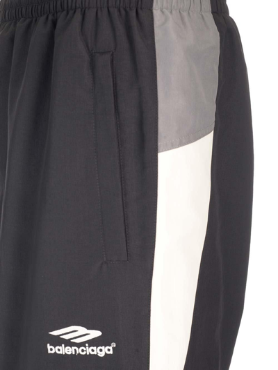 Shop Balenciaga Logo Print Panelled Track Pants In Black