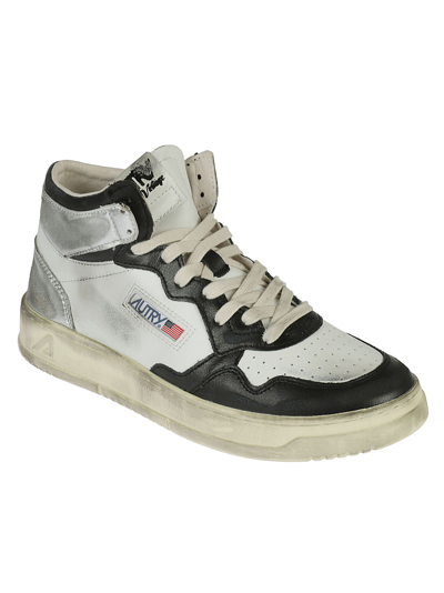 Shop Autry Vintage Medalist Mid Sneakers In White Black Silver