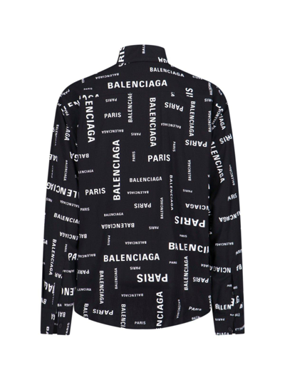 Shop Balenciaga Allover Logo Printed Long-sleeved Shirt In Black/white