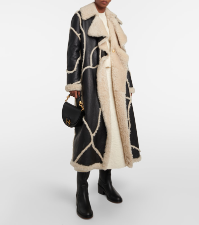 Shop Chloé Shearling And Leather Coat In Black