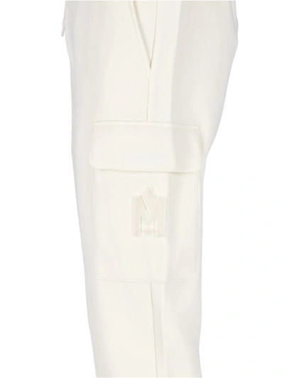 Shop Mackage Trousers In White