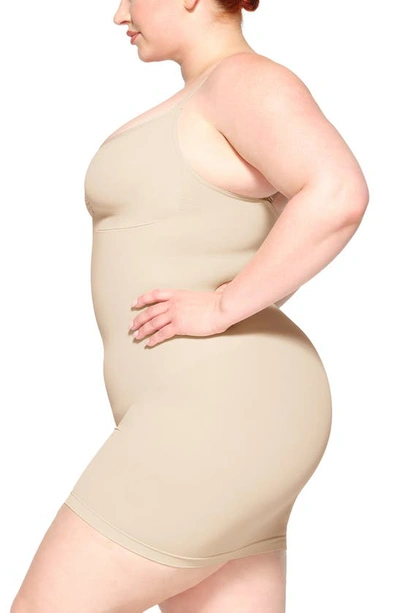 Skims Seamless Sculpt Thong Bodysuit In Sand