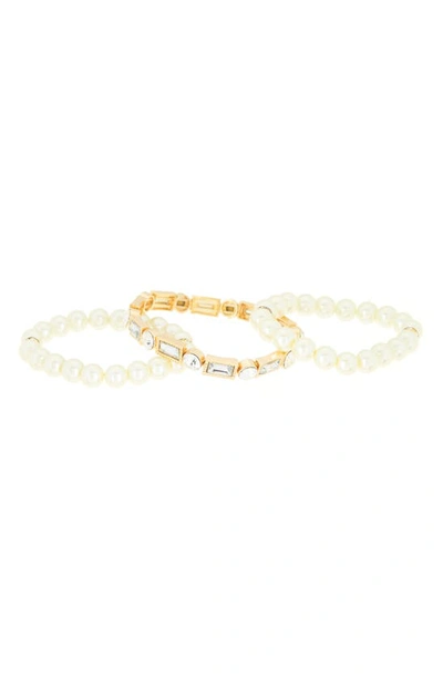 Shop Tasha Set Of 3 Imitation Pearl & Crystal Stretch Bracelets In Ivory/ Gold