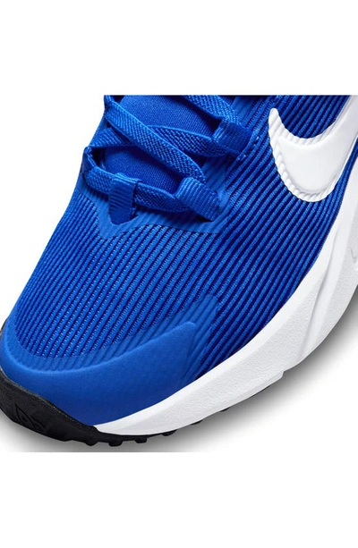 Shop Nike Kids' Star Runner 4 Sneaker In Blue/ White/ Black/ White