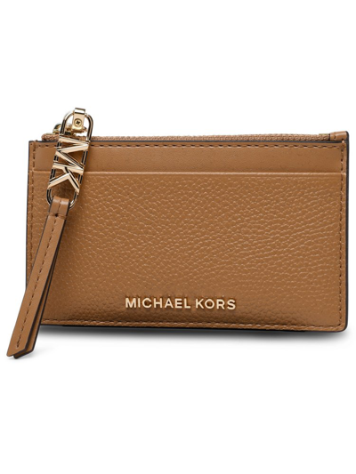 Shop Michael Michael Kors Logo Lettering Zipped Wallet In Beige