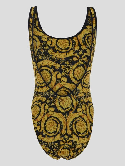 Shop Versace Underwear Swimsuit In Gold+print