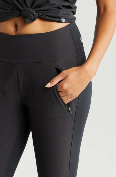 Shop Zella Onward Hybrid Zip Pocket Leggings In Black